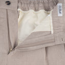 Tailored double-pleat drawstring trousers in natural raw linen P2S